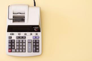 white Canon cash register by StellrWeb courtesy of Unsplash.